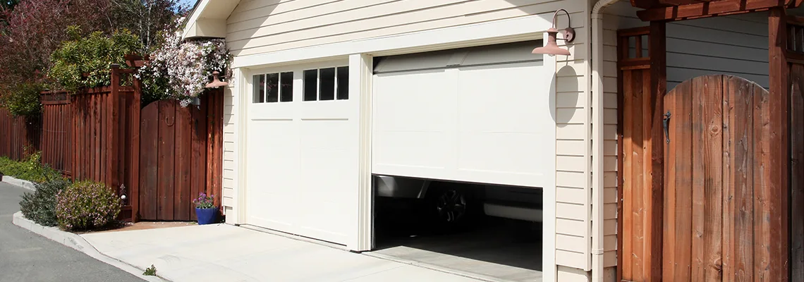 Fix Metal Garage Door Jerking in Oswego, Illinois